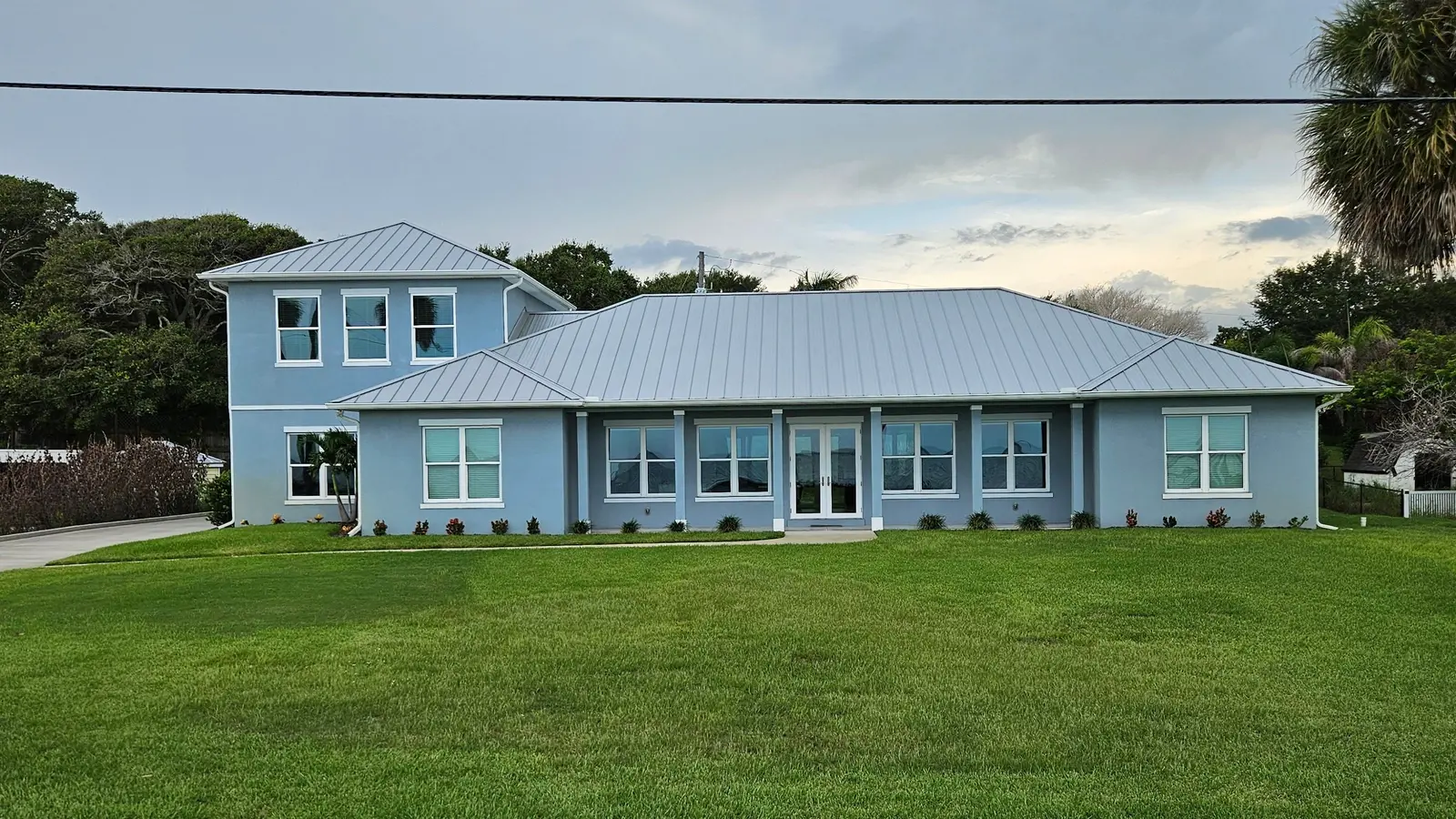 Metal Roof vs. Asphalt Shingle: Which Costs Less in Florida Over Time?